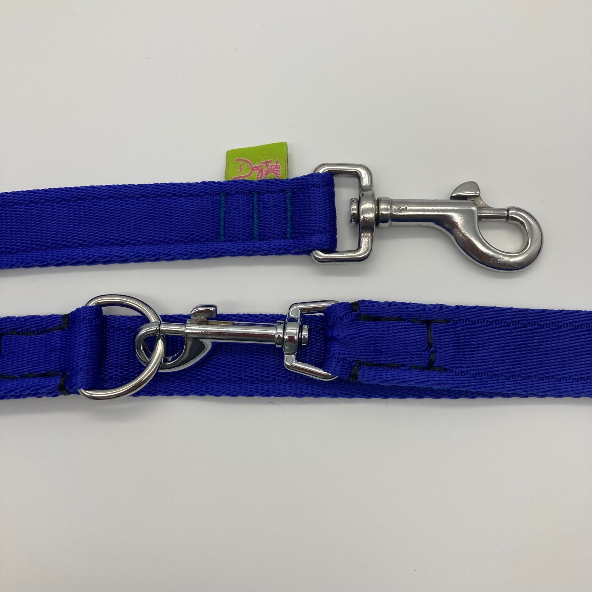 blue multifunctional leash in size large, showing the 2 stainless steel hooks and the applegreen label with DogTools logo on it
