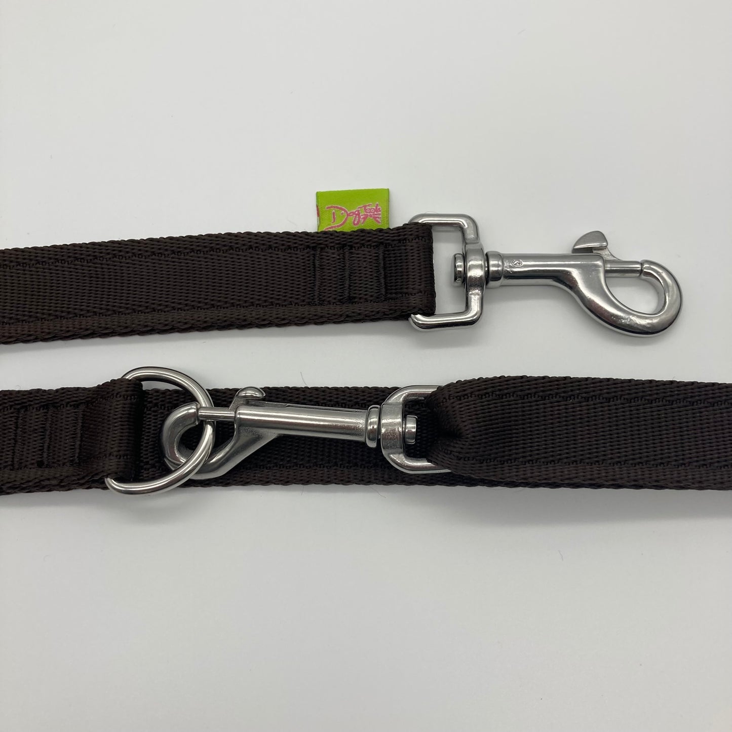 brown multifunctional leash in size large, showing the 2 stainless steel hooks and the applegreen label with DogTools logo on it