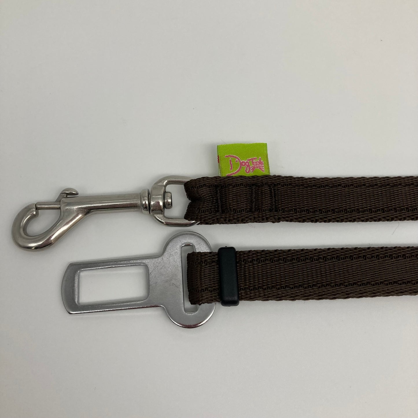 brown car safety belt, showing the stainless steel hook and the stainless steel buckle, applegreen label with the DogTools logo
