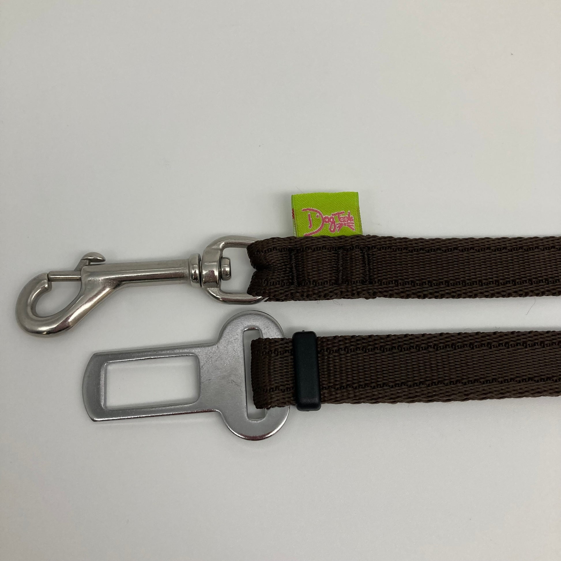 brown car safety belt, showing the stainless steel hook and the stainless steel buckle, applegreen label with the DogTools logo