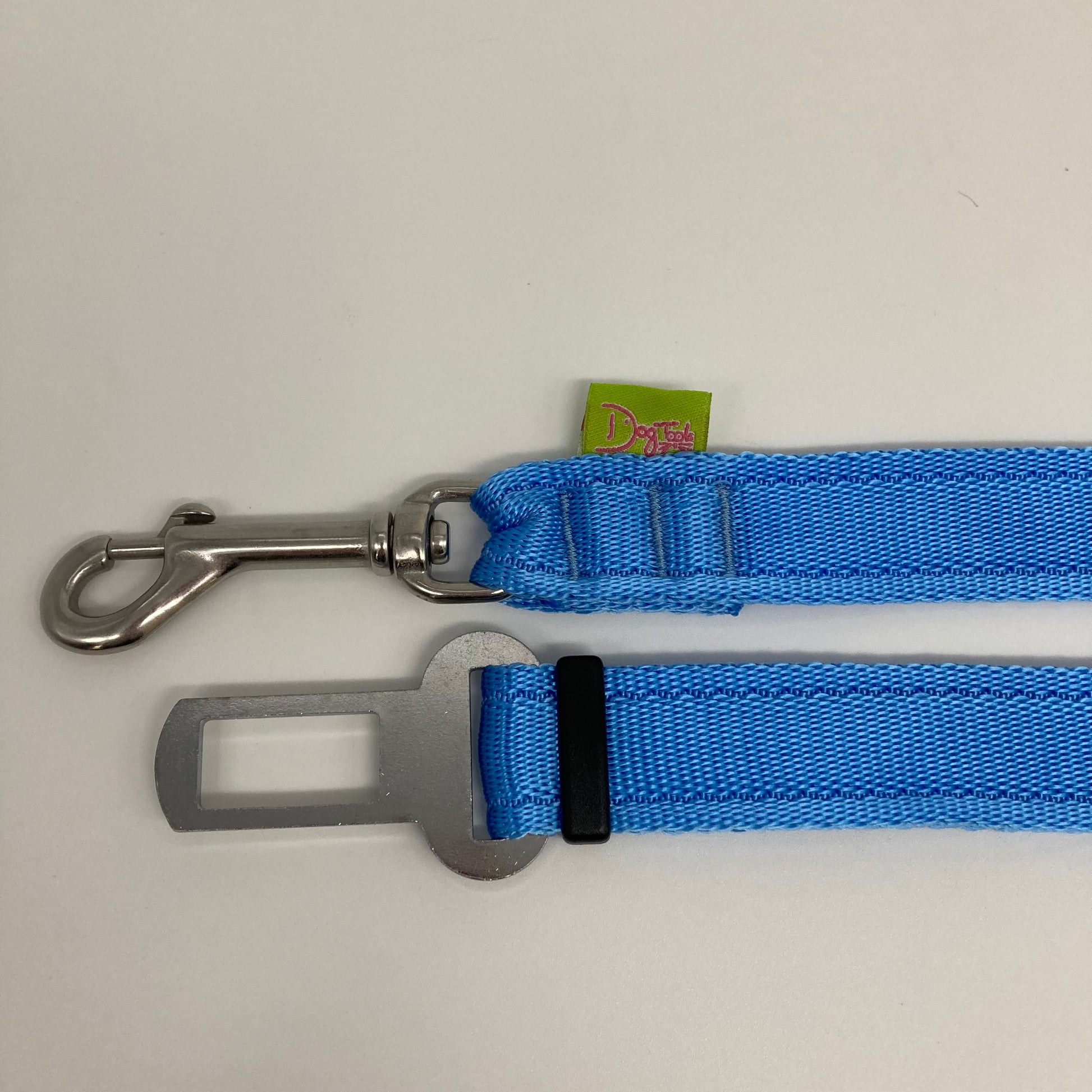 light blue car safety belt, showing the stainless steel hook and the stainless steel buckle, applegreen label with the DogTools logo