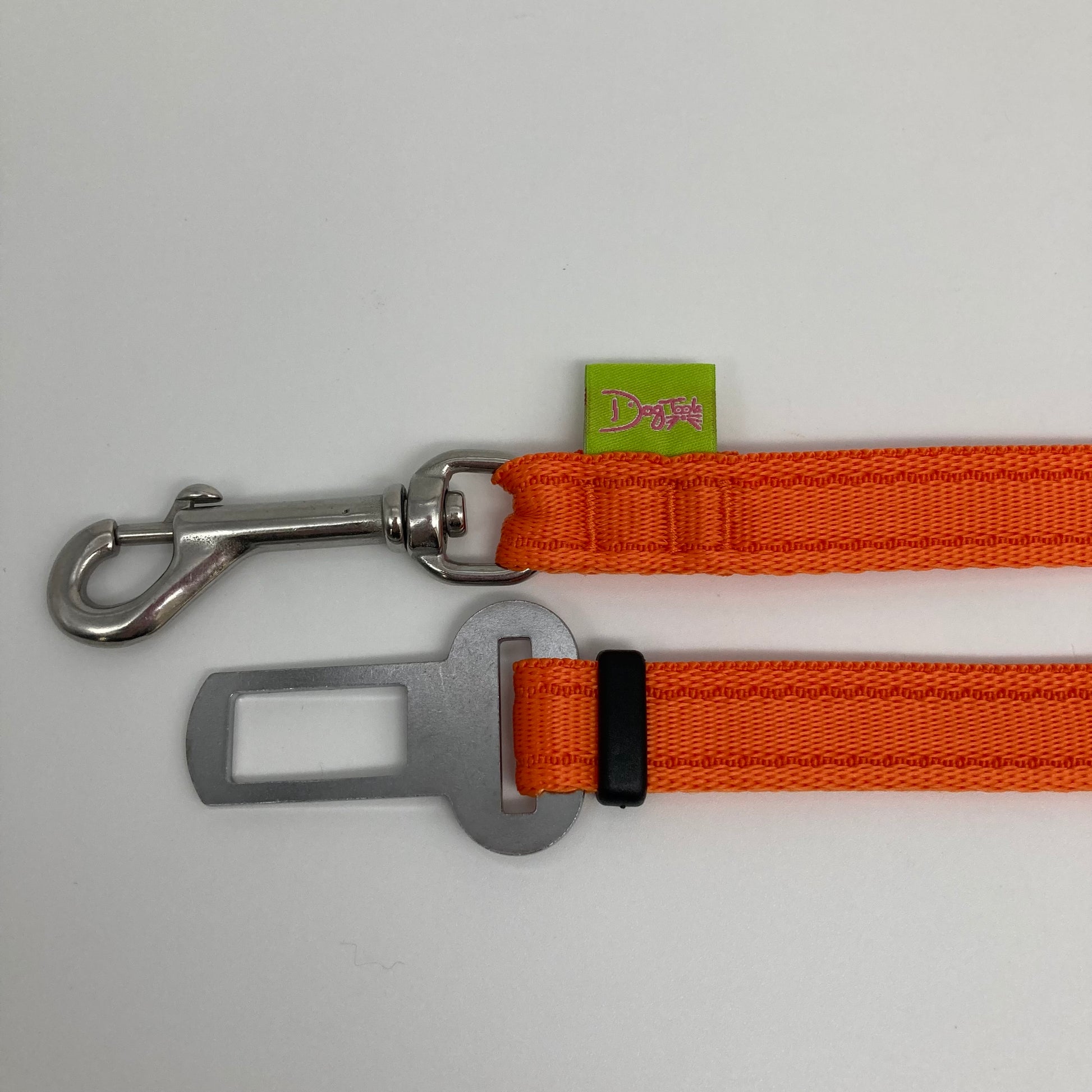 orange car safety belt, showing the stainless steel hook and the stainless steel buckle, applegreen label with the DogTools logo