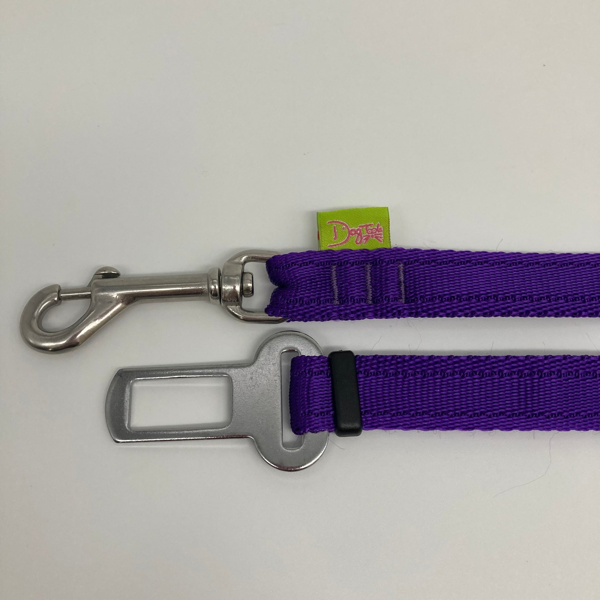 purple car safety belt, showing the stainless steel hook and the stainless steel buckle, applegreen label with the DogTools logo