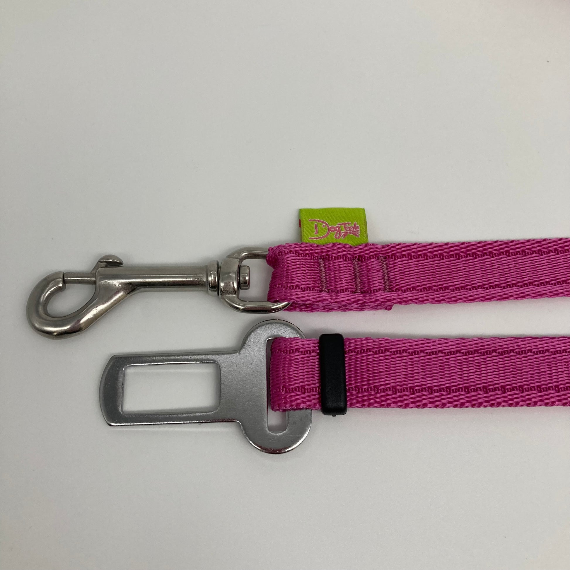 pink car safety belt, showing the stainless steel hook and the stainless steel buckle, applegreen label with the DogTools logo