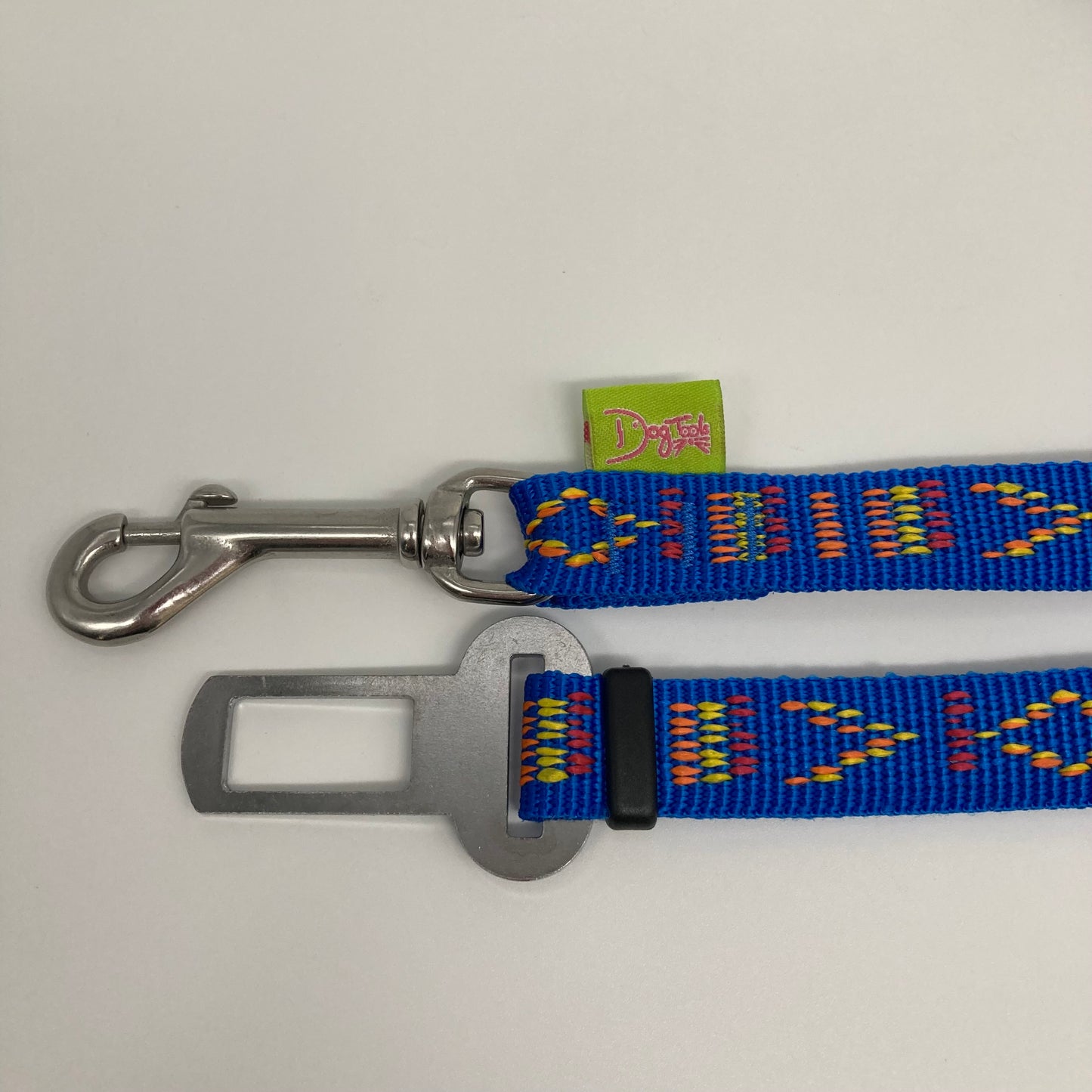 blue Stitch (blue fabric with print in 3 colors, red, yellow and orange) car safety belt, showing the stainless steel hook and the stainless steel buckle, applegreen label with the DogTools logo