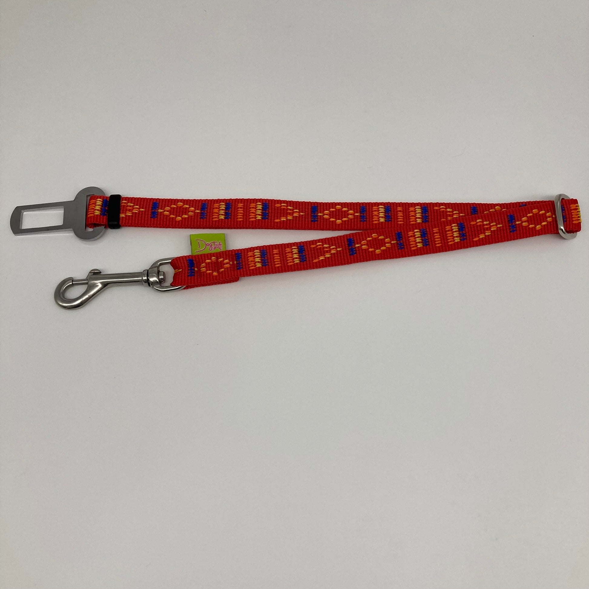 red Stitch (red fabric with print in 3 colors, yellow, orange and blue) car safety belt, showing in full, horizontally