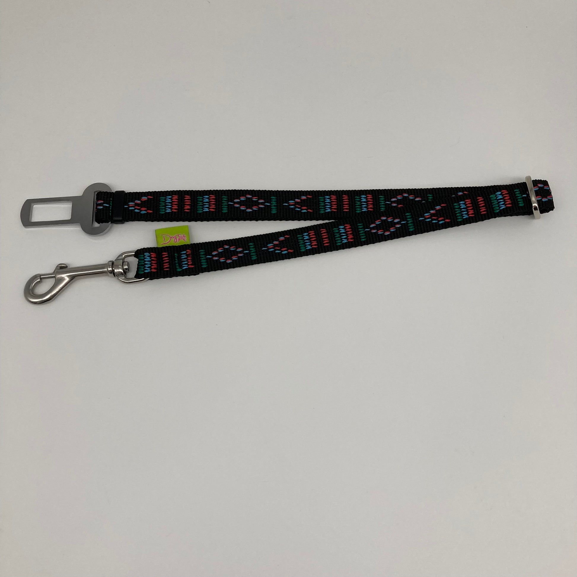 black Stitch (black fabric with print in 3 colors, red, light blue and green) car safety belt, showing in full, horizontally