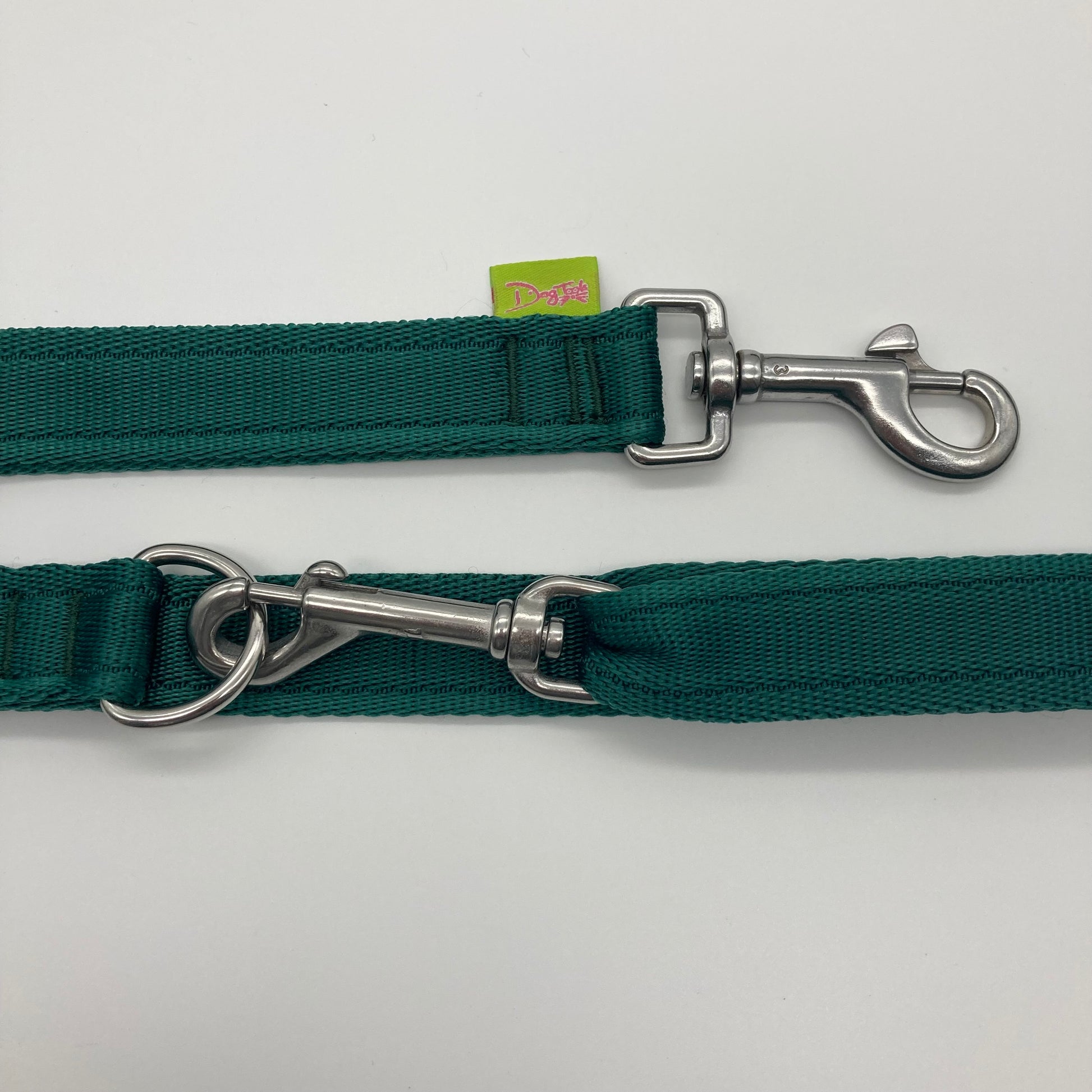 green multifunctional leash in size large, showing the 2 stainless steel hooks and the applegreen label with DogTools logo on it