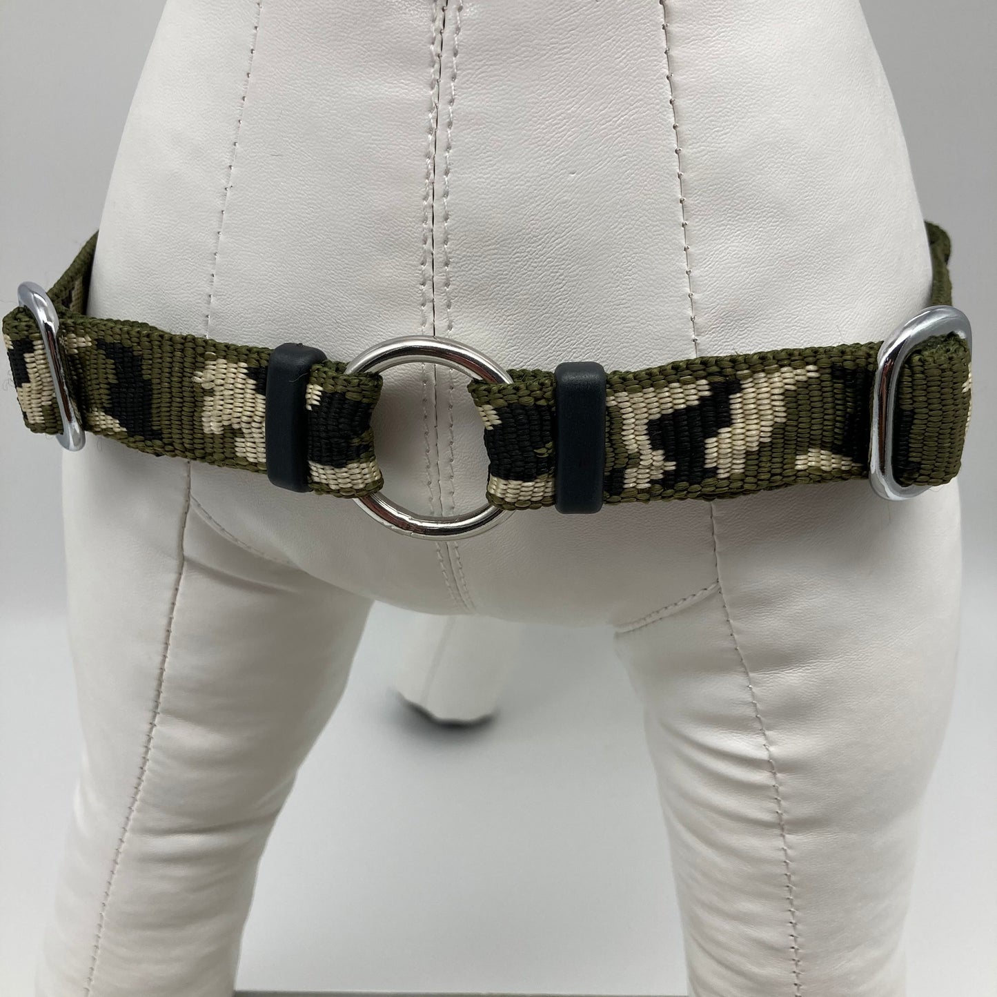 army green (army print in 3 colors, olive green, beige and black) harness, showing the chest from the front, the stainless steel ring where the leash is attached to
