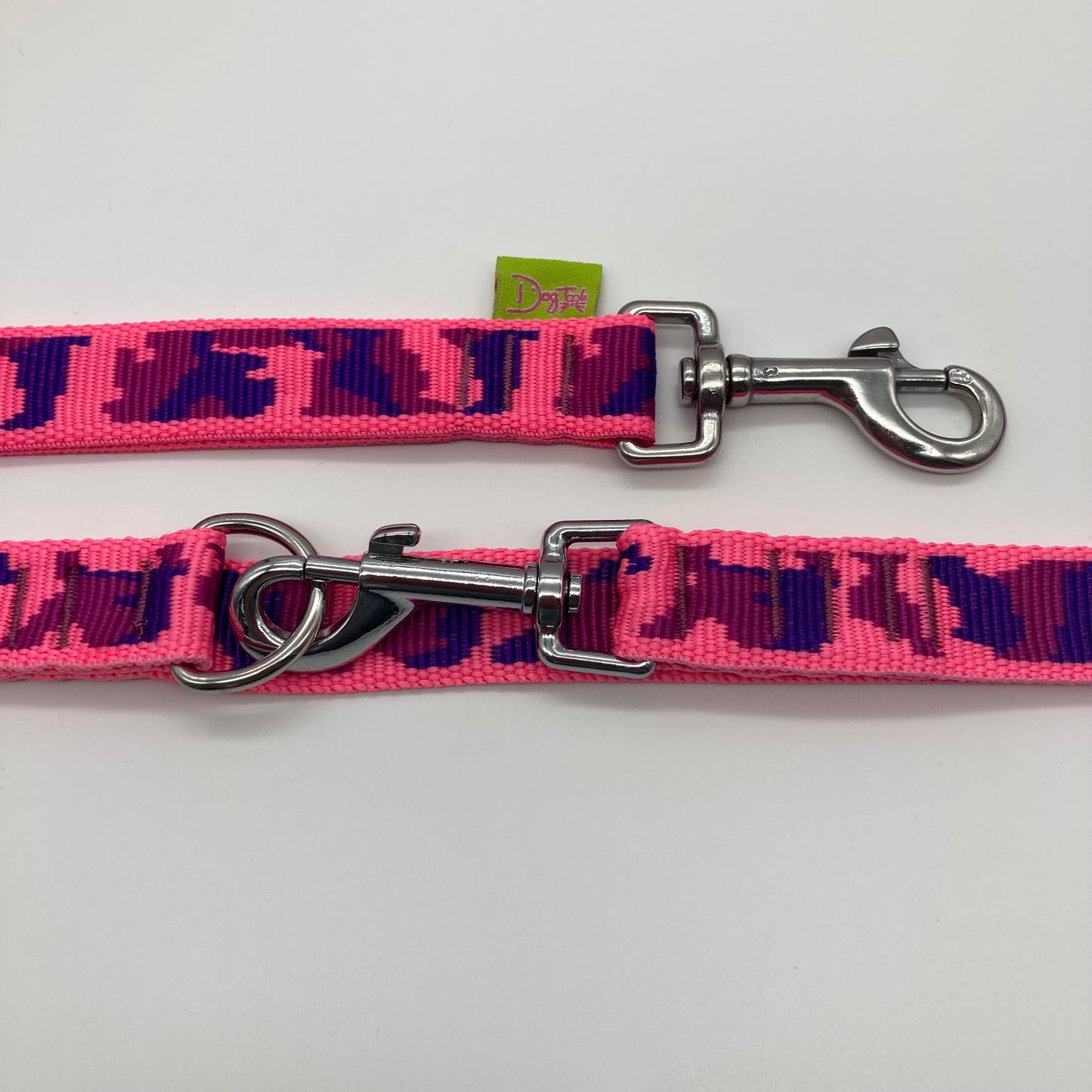 army pink (army print in 3 colors, fushia, purple and pink) multifunctional leash in size large, showing the 2 stainless steel hooks and the applegreen label with DogTools logo on it