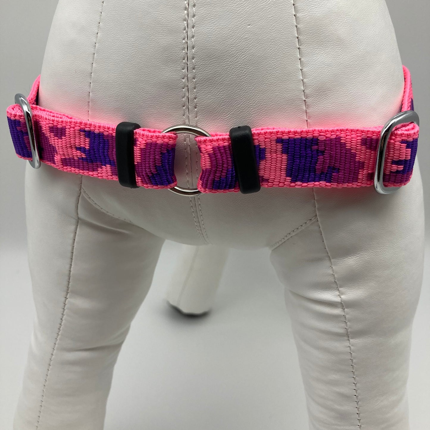army pink (army) harness, showing the chest from the front, the stainless steel ring where the leash is attached to