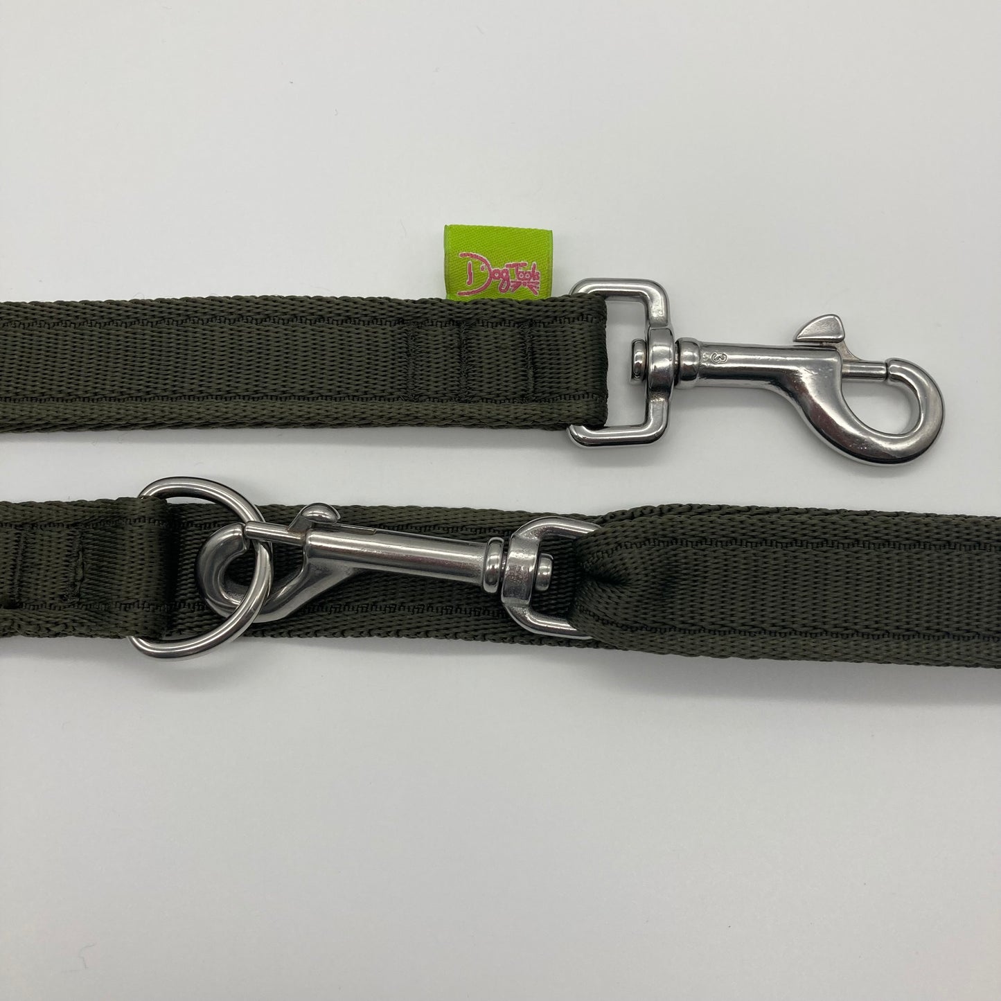 olive green multifunctional leash in size large, showing the 2 stainless steel hooks and the applegreen label with DogTools logo on it