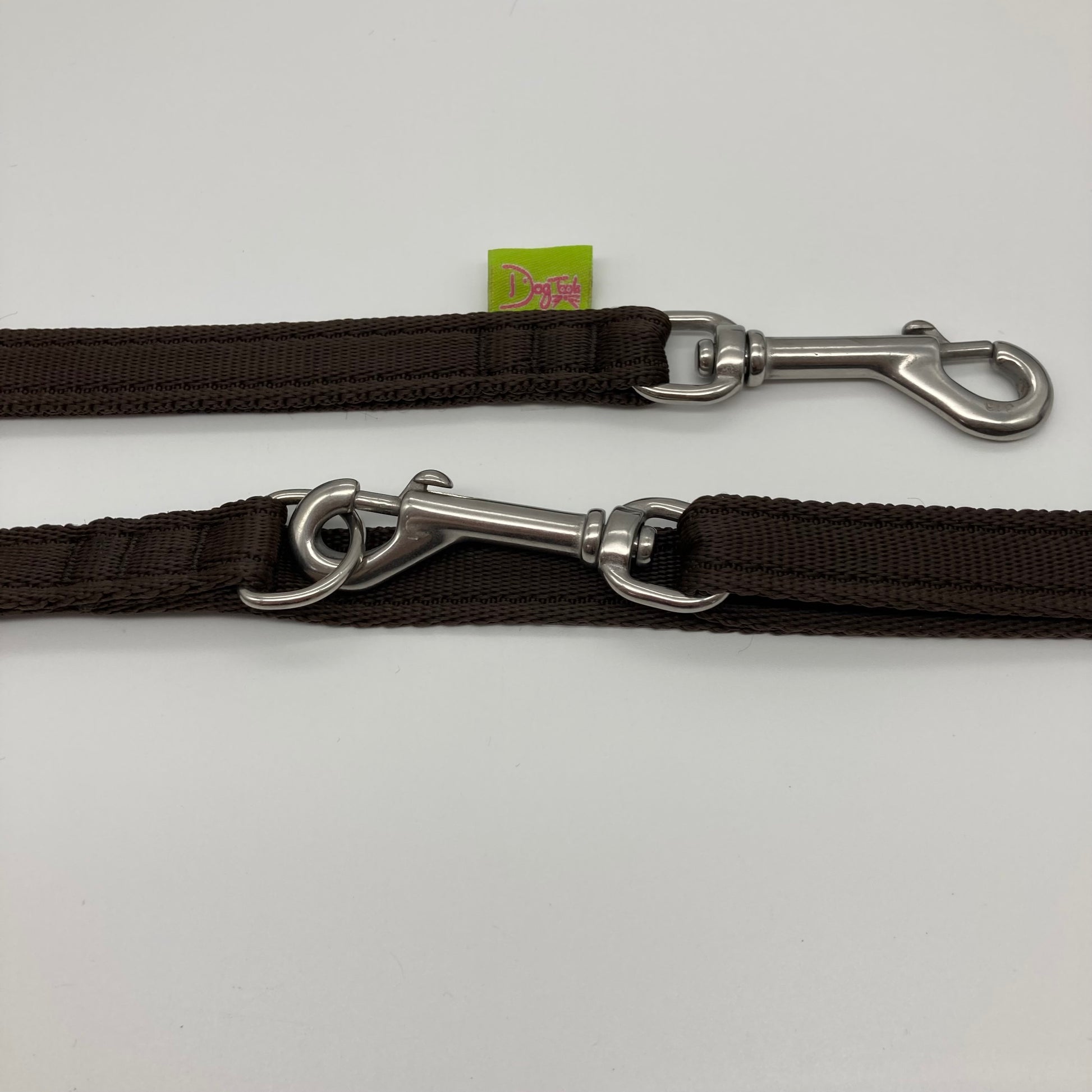 brown multifunctional leash in size small, showing the 2 stainless steel hooks and the applegreen label with DogTools logo on it
