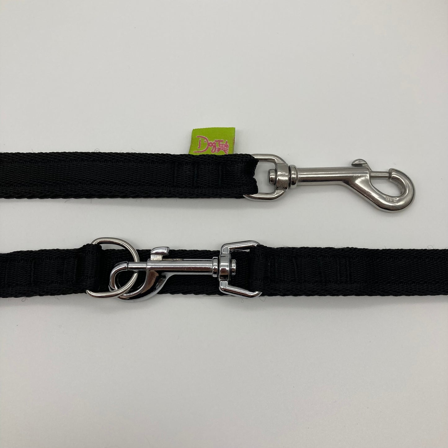 black multifunctional leash in size small, showing the 2 stainless steel hooks and the applegreen label with DogTools logo on it