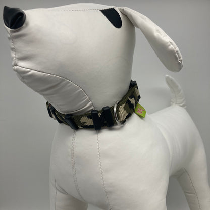 army green (army print in 3 colors, olive green, beige and black) collar displayed on a stuffed toy (dog), from the front of the dog, showing its head and torso